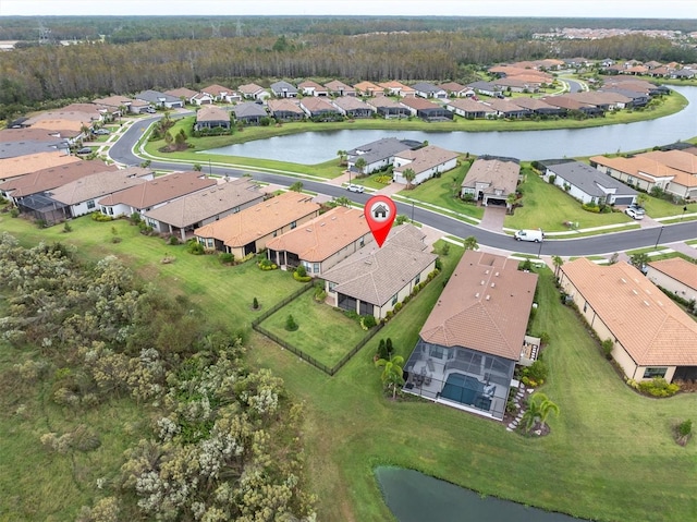 drone / aerial view with a water view