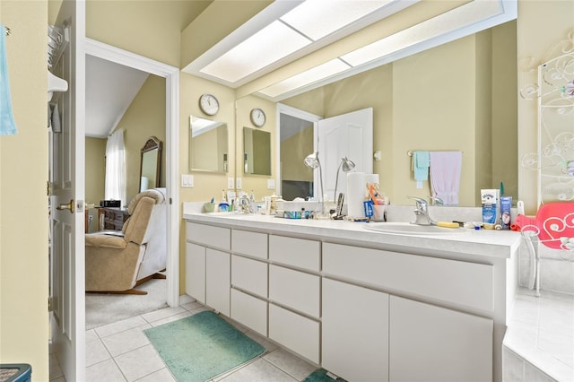 bathroom with vanity and tile patterned floors