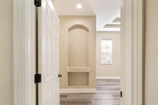 corridor featuring light hardwood / wood-style floors