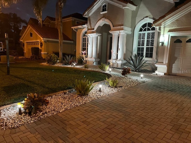 view of front of home featuring a garage