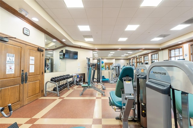 workout area featuring a drop ceiling