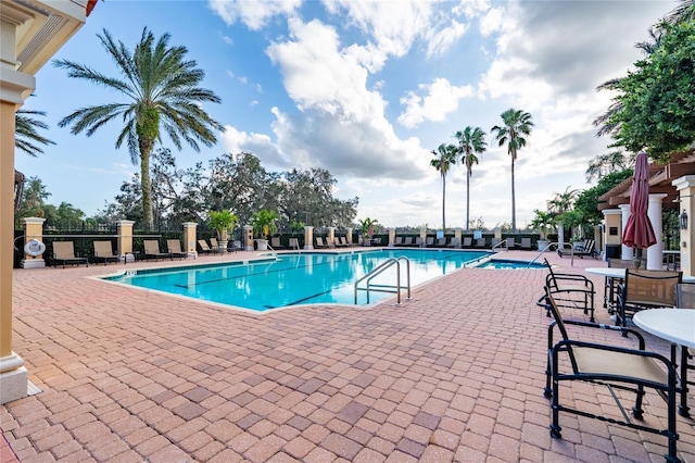 view of pool featuring a patio