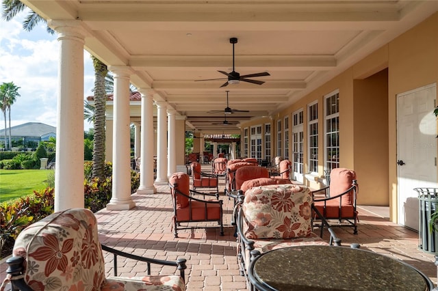 view of patio / terrace featuring a mountain view, an outdoor hangout area, and ceiling fan