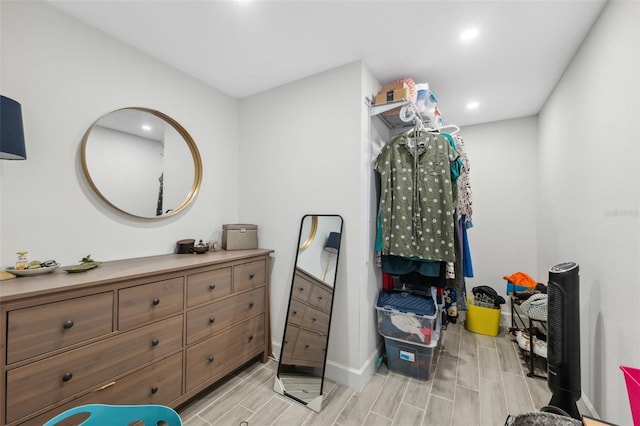 spacious closet featuring light hardwood / wood-style flooring