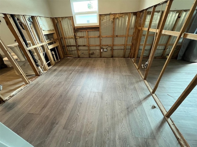 miscellaneous room featuring wood finished floors