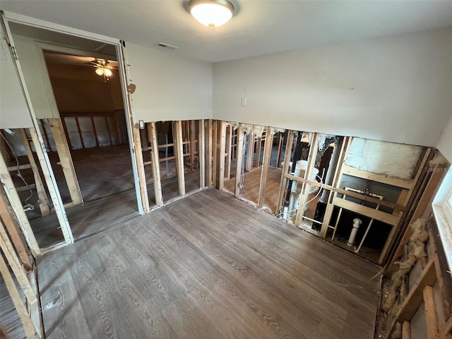 unfurnished room featuring wood finished floors and ceiling fan
