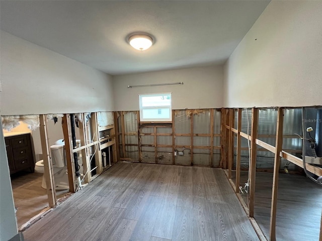 miscellaneous room with wood finished floors