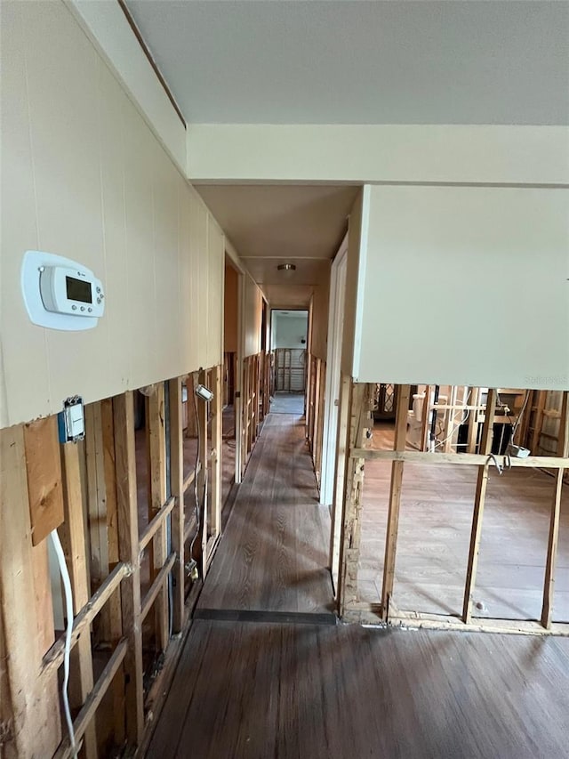 hall with dark wood-style floors
