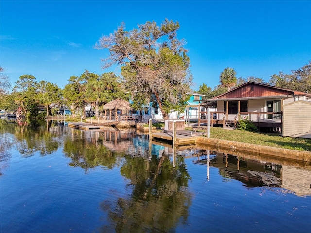 dock featuring a deck with water view