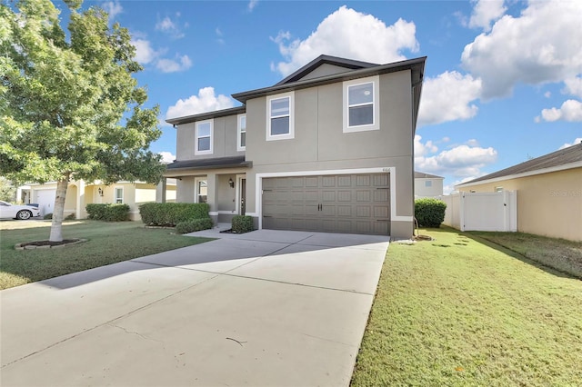 front facade featuring a garage and a front yard