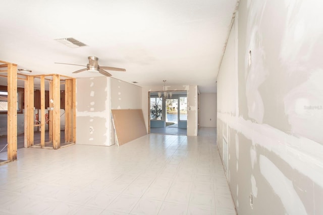 unfurnished room featuring ceiling fan