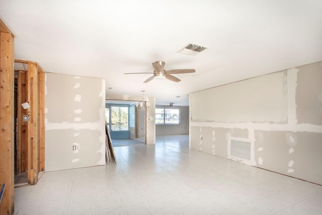 unfurnished room with ceiling fan