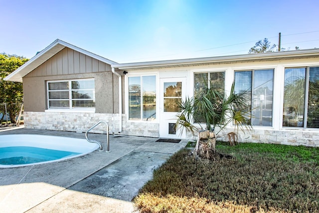 back of house featuring a patio