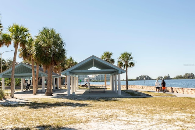 surrounding community featuring a gazebo and a water view