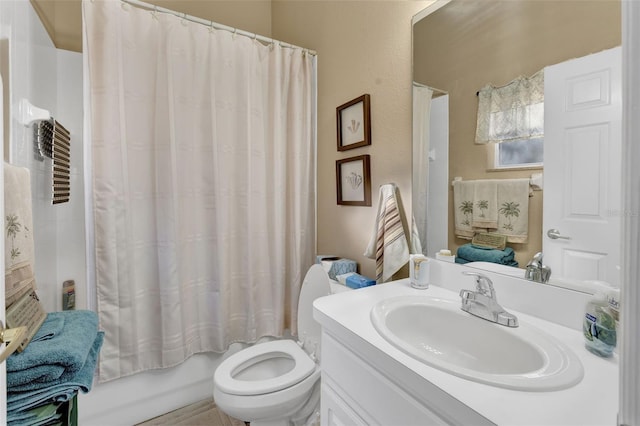 2533 Wood Pointe Dr, Holiday, FL 34691 - bathroom featuring vanity, shower / tub combo, and toilet
