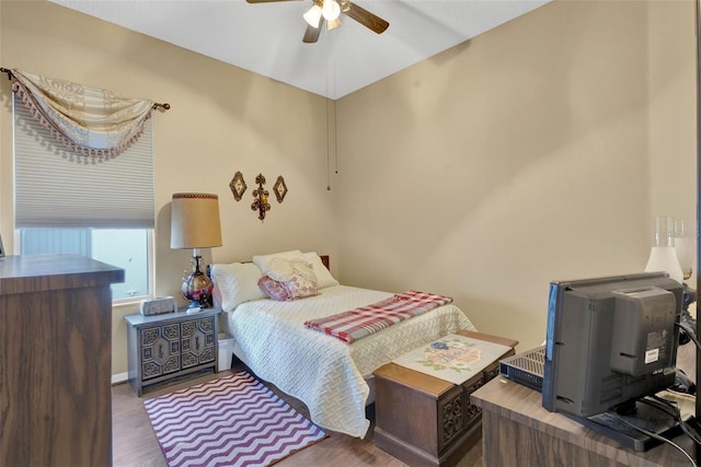 2533 Wood Pointe Dr, Holiday, FL 34691 - bedroom featuring wood finished floors and ceiling fan