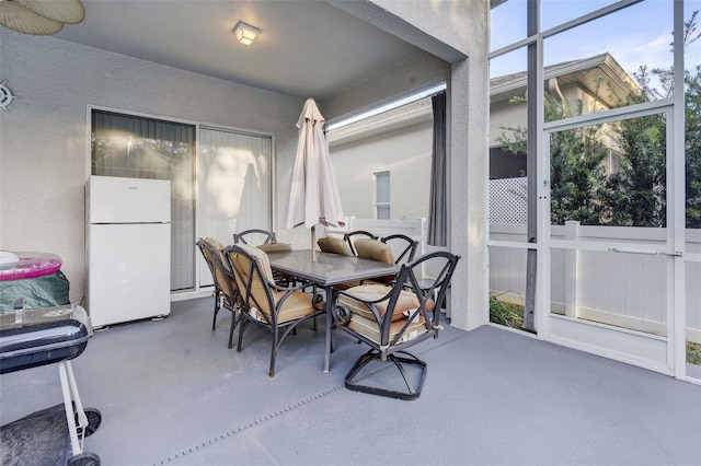 dining area with concrete floors