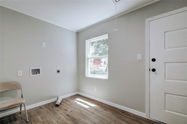 laundry area featuring washer hookup, electric dryer hookup, wood-type flooring, and ornamental molding