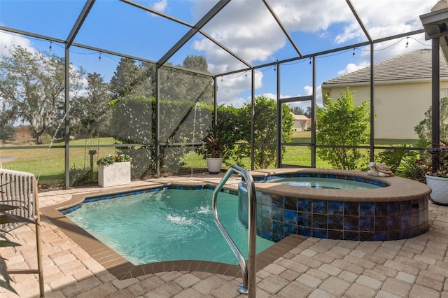 view of pool featuring a lanai, an in ground hot tub, a lawn, and a patio