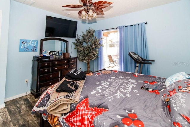 bedroom with hardwood / wood-style flooring and ceiling fan