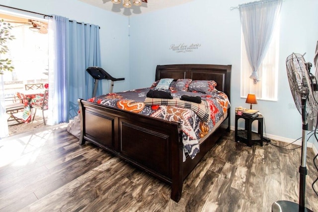 bedroom featuring dark hardwood / wood-style flooring