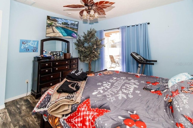 bedroom featuring hardwood / wood-style floors and ceiling fan