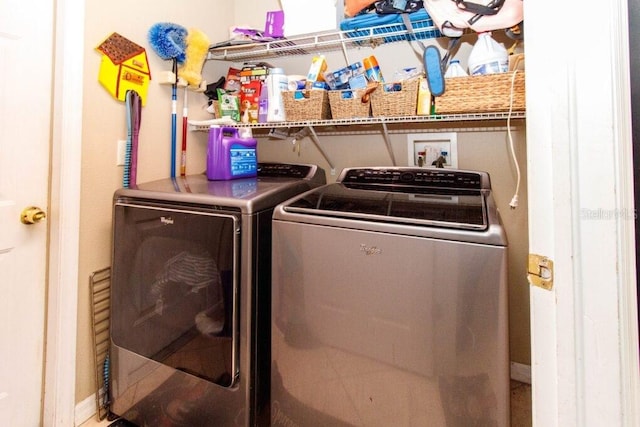 laundry area featuring washing machine and dryer