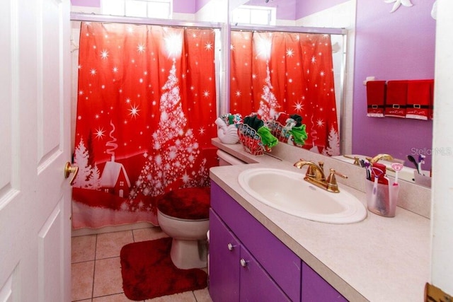 full bathroom featuring shower / washtub combination, tile patterned flooring, vanity, and toilet