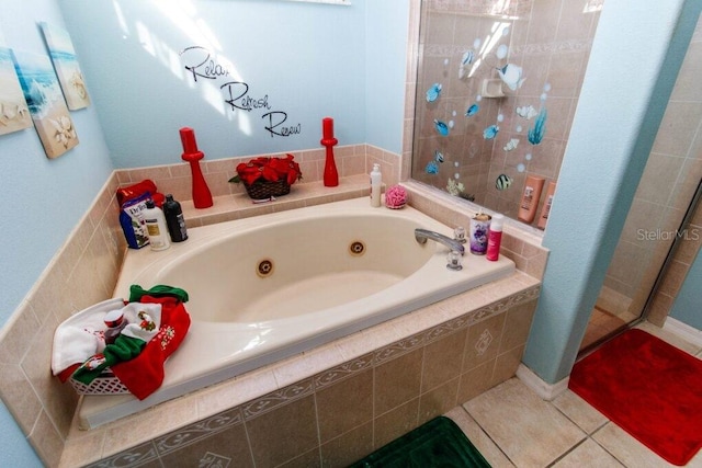 bathroom featuring tile patterned flooring and shower with separate bathtub