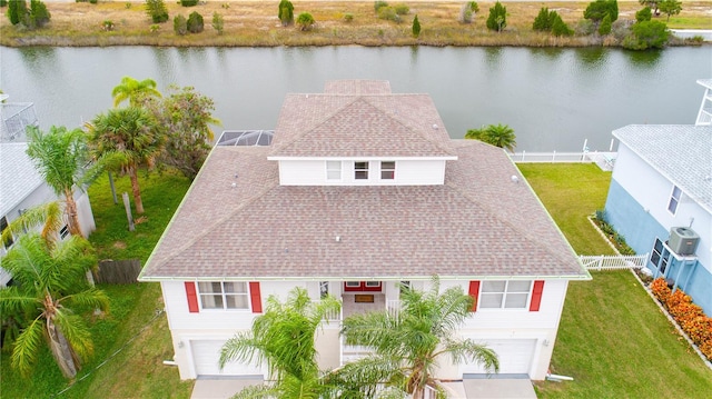 birds eye view of property featuring a water view