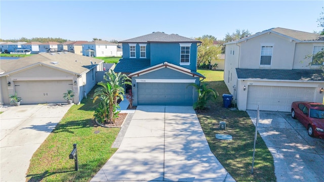 front facade featuring a front yard and a garage