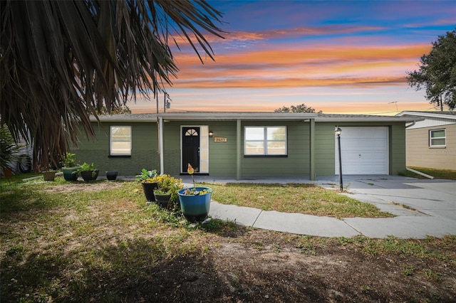 single story home featuring a garage