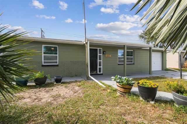 view of front of home with a garage