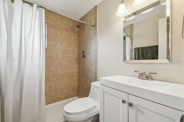 bathroom featuring vanity, toilet, and a shower with curtain