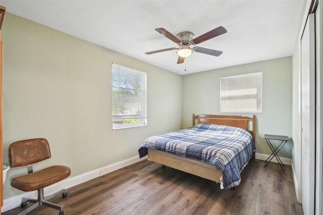 bedroom featuring ceiling fan and dark hardwood / wood-style flooring