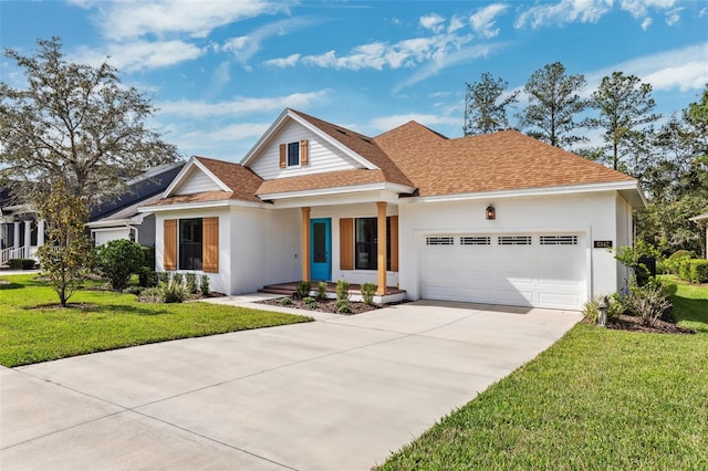 view of front facade featuring a garage and a front lawn