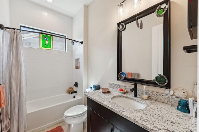 full bathroom featuring vanity, shower / bathtub combination with curtain, and toilet