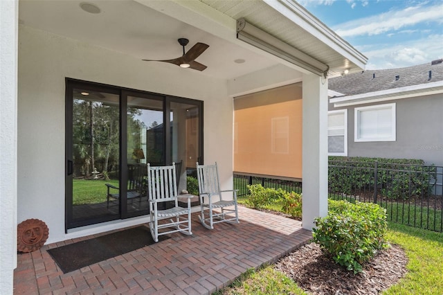 view of patio / terrace featuring ceiling fan