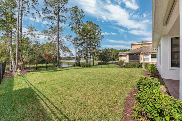 view of yard with a water view