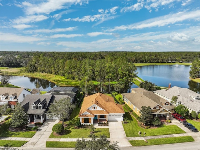 bird's eye view with a water view