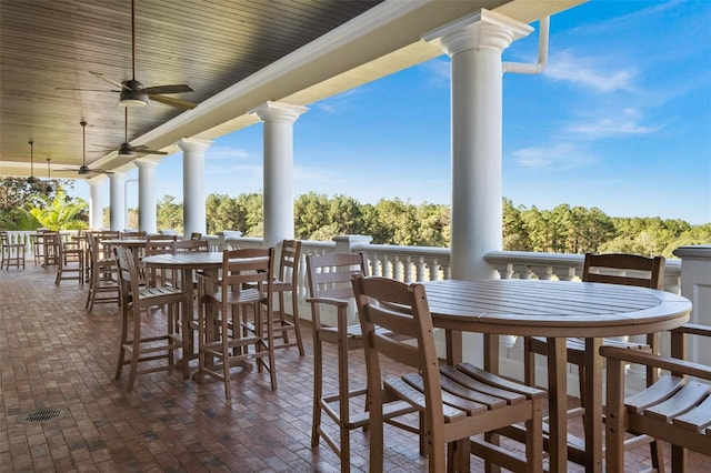 view of patio featuring ceiling fan