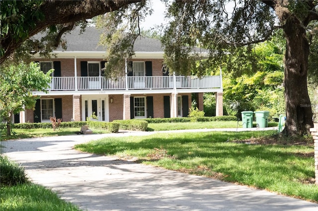 exterior space featuring a balcony