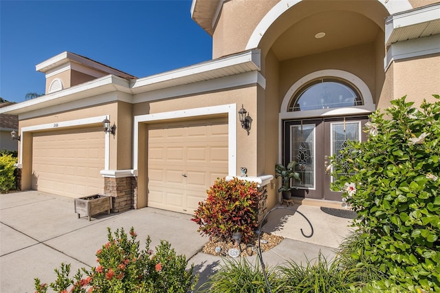 doorway to property featuring a garage