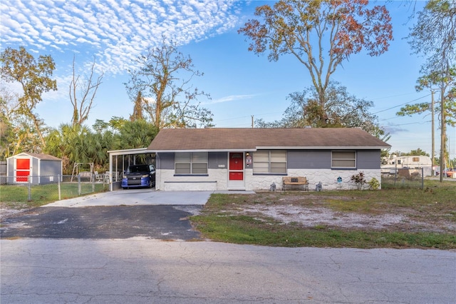 view of front facade with a carport