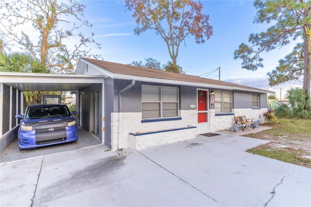 view of front facade featuring a carport