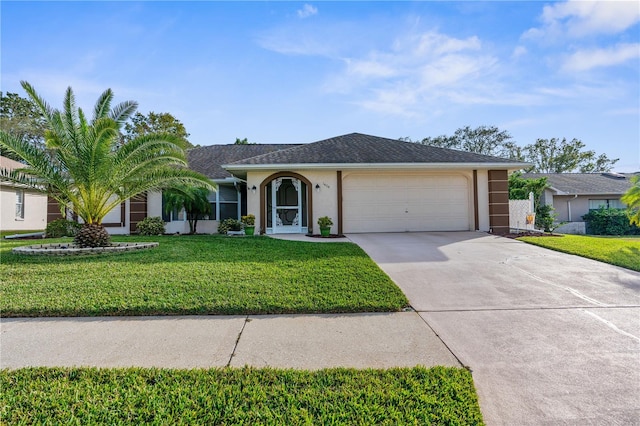 ranch-style house featuring a garage and a front lawn