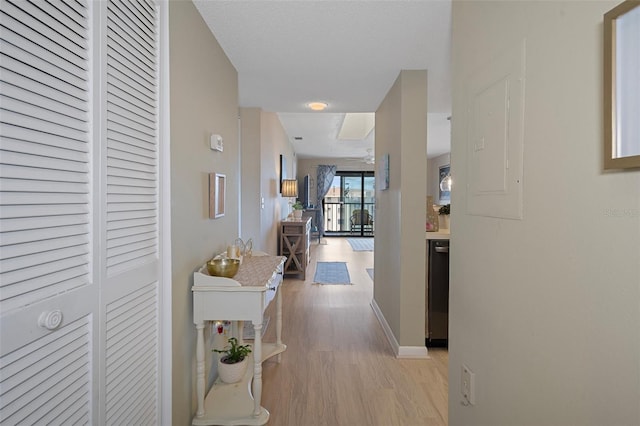 8141 Aquila St Unit 347, Port Richey, FL 34668 - hall featuring light wood-style flooring and baseboards