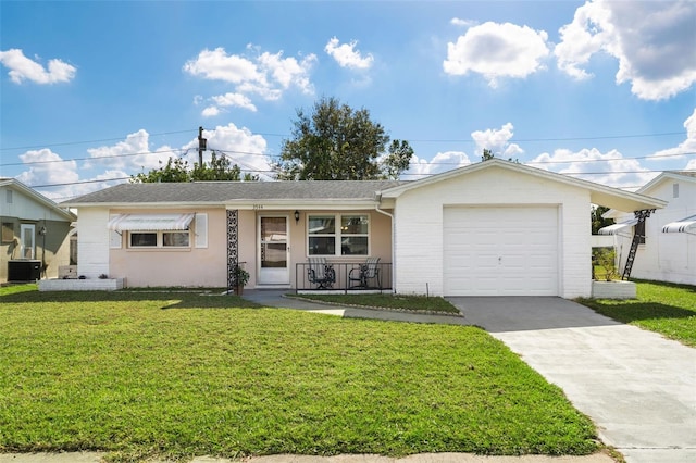 ranch-style house featuring a front yard, a garage, and cooling unit