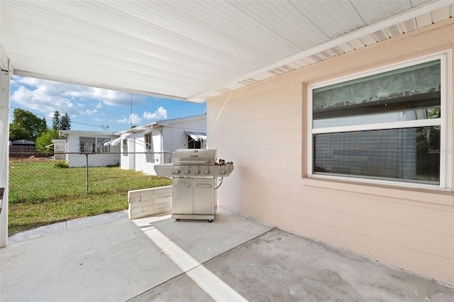 view of patio with a grill