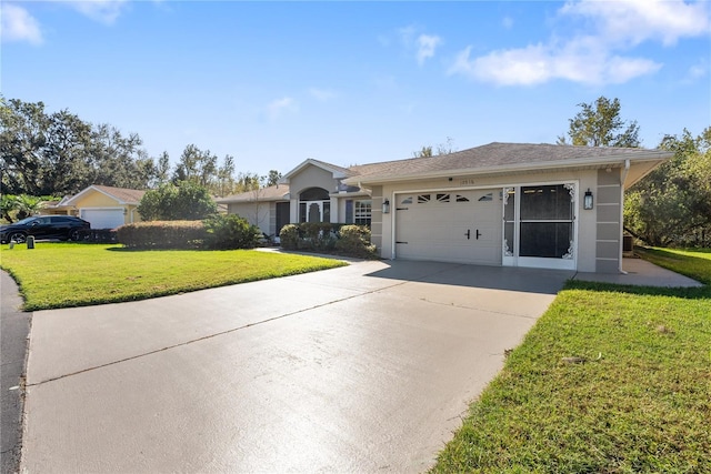 ranch-style house with a garage and a front yard